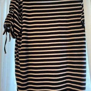 Black/white striped shirt tag removed. Size large